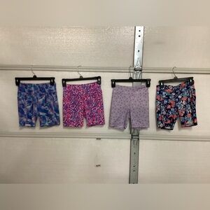 Four pair of girls exercise shorts, size 8/10